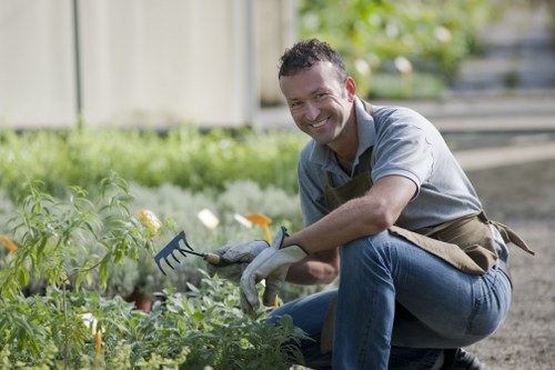 Professional garden waste loading for disposal in Poplar